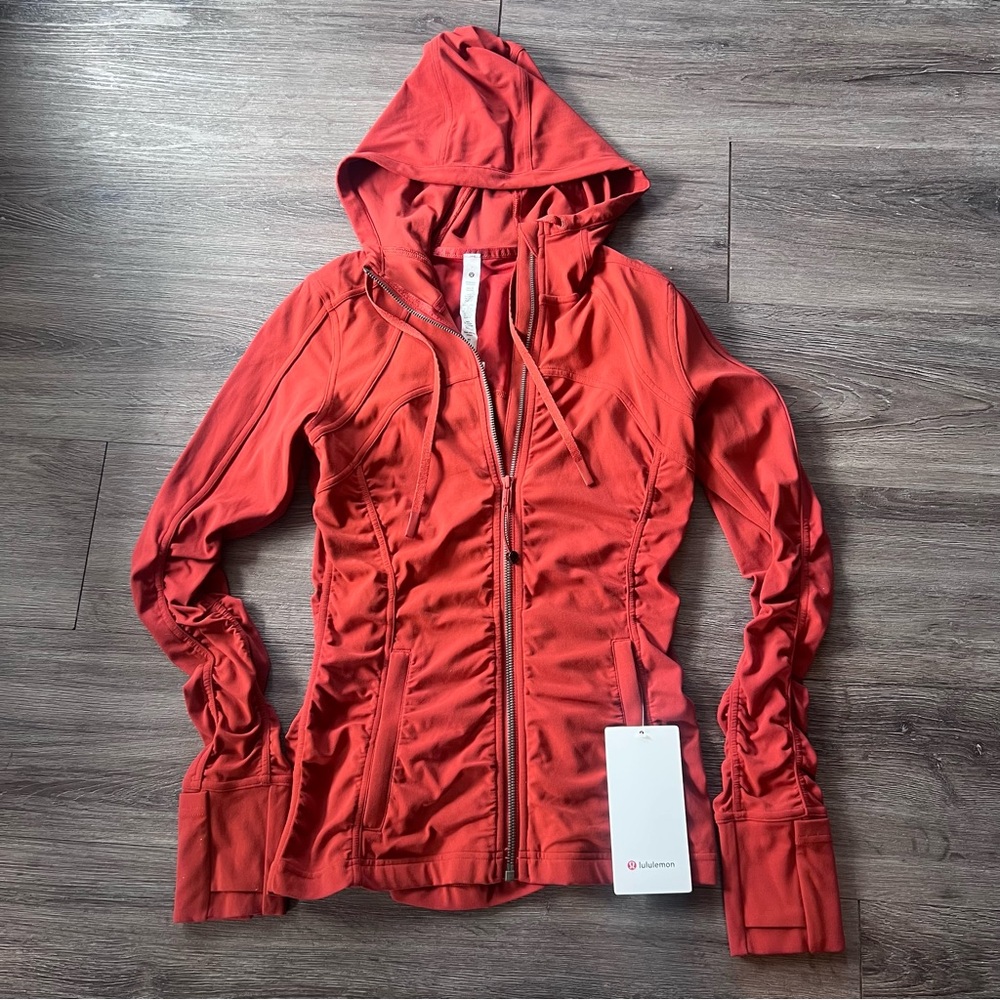 NWT Lululemon Nulu Hooded Define Jacket *Ruched in
Cayenne, size 6